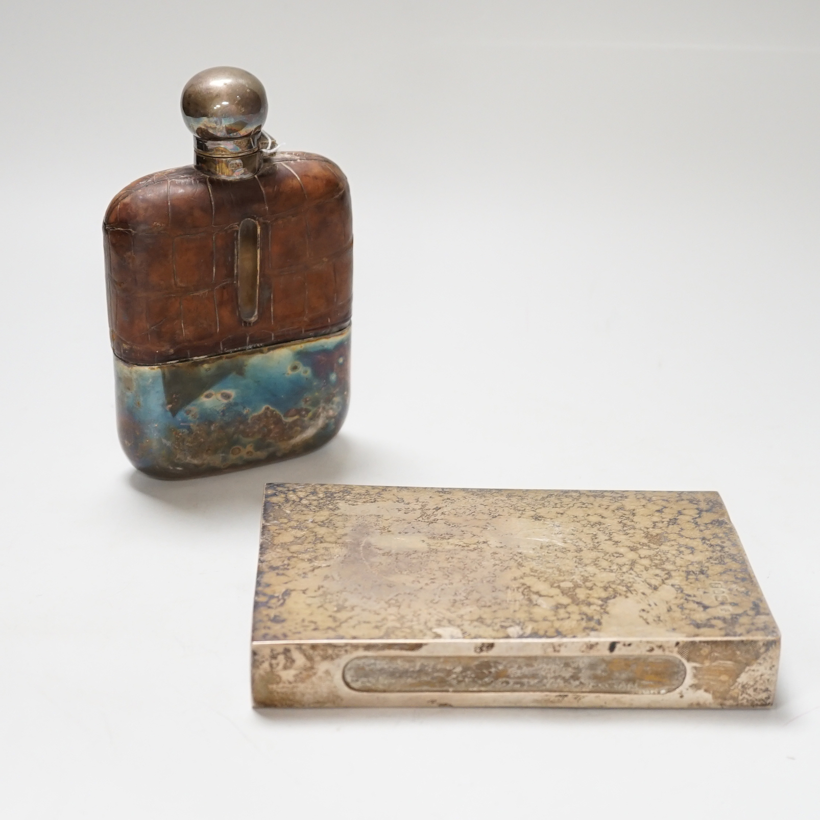 A large George V silver matchbox holder with vintage Swan Vesta's matchbox inside, London 1913, 16cm, net weight 223 grams, and a George V crocodile and glass pocket flask with plated mounts